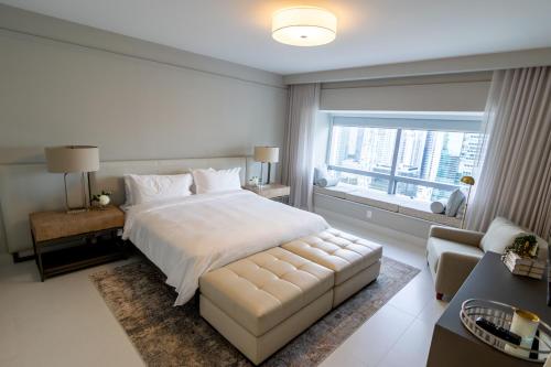 Ένα ή περισσότερα κρεβάτια σε δωμάτιο στο King Suite - City View at Four Seasons Miami