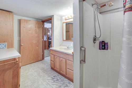 a bathroom with a sink and a shower at Peaceful Channing Retreat 3 Mi to Lake Access! 