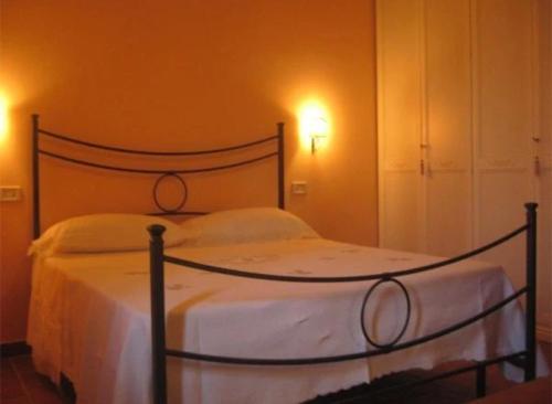 Postel nebo postele na pokoji v ubytování Agriturismo Nonna Luisa