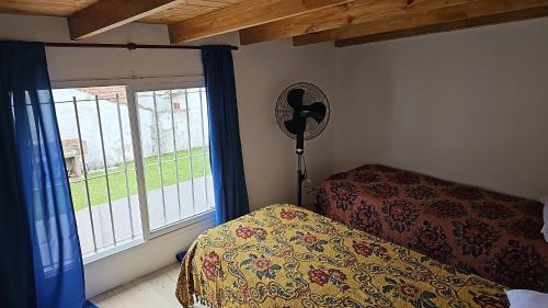 En eller flere senge i et værelse på Santa Clara