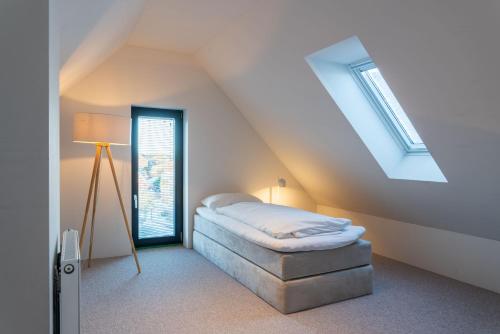 Postel nebo postele na pokoji v ubytování Strandlust 21B Wohnung