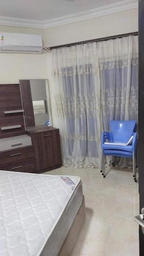 Postel nebo postele na pokoji v ubytování La Quinta Resort Hurghada