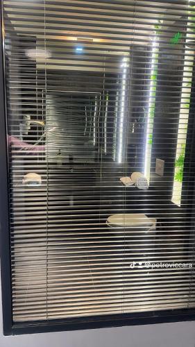 a window with blinds on a window with sinks at Russ Spa in Mladenovac
