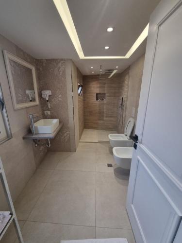 Un baño de HOTEL VILA TWIX