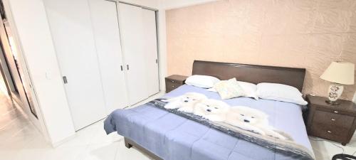 Cama o camas de una habitación en Amplio y lindo apartamento