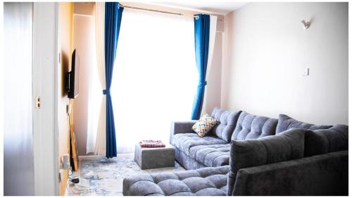Χώρος καθιστικού στο Anne's Luxurious Thindigua Apartment