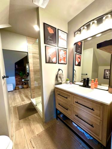 a bathroom with a sink and a shower at Trumbull 300 in Detroit
