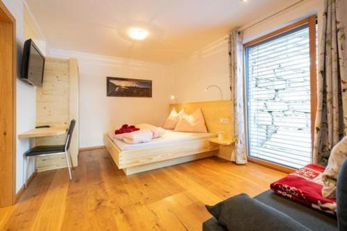 Postel nebo postele na pokoji v ubytování Ferienwohnung Hinterlehen