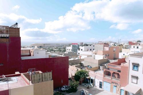 a view of a city from a building at Olympe Surf & Yoga in Tamraght Ouzdar