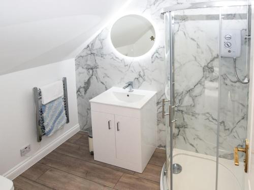a bathroom with a shower and a sink at 3 bed in Brighstone IC041 in Brighstone