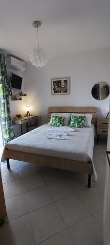 a bedroom with a bed in a room at Actis studios 1 in Stelida