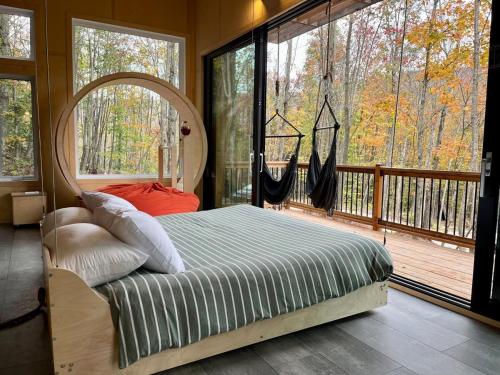 Ένα ή περισσότερα κρεβάτια σε δωμάτιο στο Cabin Zoobox 77
