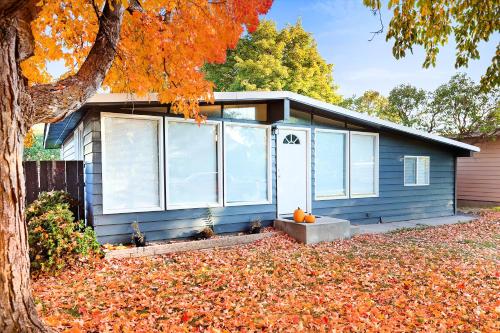 a blue house with a pumpkin in front of it at Bright & Stylish 2 Bedroom Home in Missoula