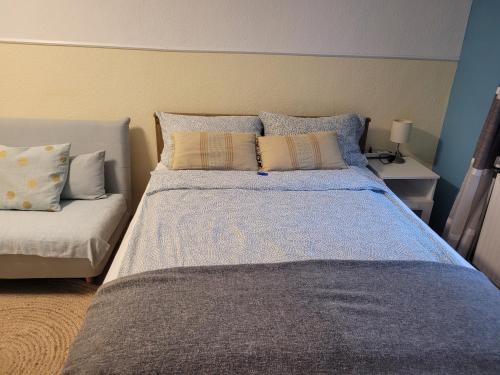Cama o camas de una habitación en Gästehaus Kampik
