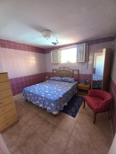 Säng eller sängar i ett rum på 2 bedrooms property with shared pool at Porto Cesareo 1 km away from the beach