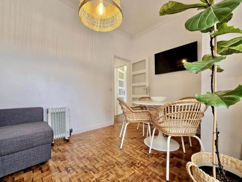 a living room with a couch and a table at LM art apartments in Porto