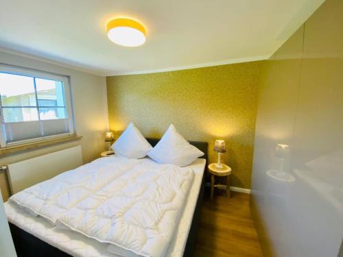 Postel nebo postele na pokoji v ubytování Ferienwohnung Sol im idyllischen Pruchten