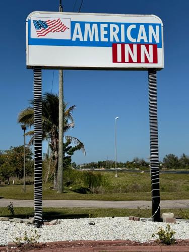 Сертификат, награда, вывеска или другой документ, выставленный в American Inn Punta Gorda