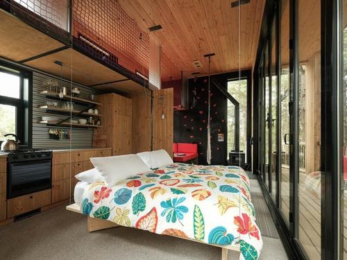 Ένα ή περισσότερα κρεβάτια σε δωμάτιο στο Cabin Zoobox 84