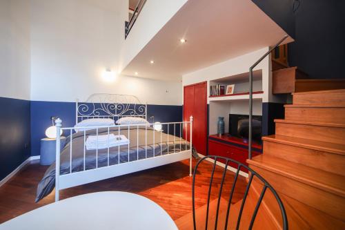 Postel nebo postele na pokoji v ubytování Salotto Borbonico