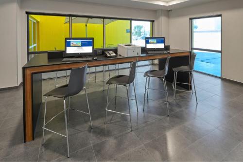 Телевизор и/или развлекательный центр в City Express by Marriott Ciudad Victoria