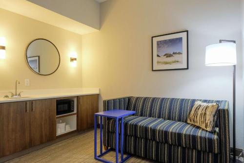a living room with a couch and a table at Hampton Inn Edenton in Edenton