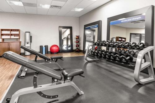 a fitness room with several rows of exercise equipment at Hampton Inn & Suites Fairbanks in Fairbanks
