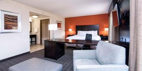 a hotel room with a bed and a desk at Hampton Inn & Suites Seneca-Clemson Area in Seneca