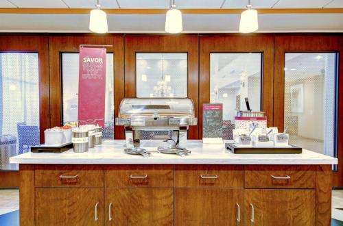 a store with a counter with aasteryasteryasteryasteryasteryasteryasteryasteryastery at Hampton Inn & Suites Harrisburg in Harrisburg