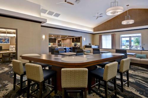 a large dining room with a large table and chairs at Homewood Suites by Hilton Hartford / Southington CT in Southington