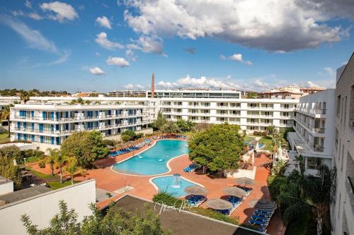 an aerial view of a resort with a swimming pool at Lucky Star Marina Apartment, with Pool in Lagos