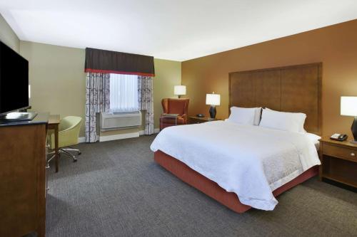 Ένα ή περισσότερα κρεβάτια σε δωμάτιο στο Hampton Inn & Suites Wichita-Northeast