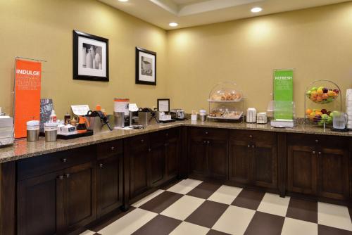 a hotel room with a counter with food on it at Hampton Inn Idaho Falls / Airport in Idaho Falls