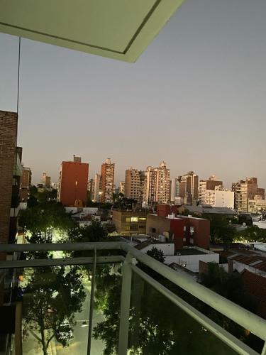 a view of a city from a balcony at temporarios en rosario in Rosario
