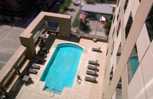 a model of a hotel with two swimming pools at Homewood Suites by Hilton Houston Downtown in Houston