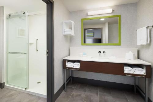 a bathroom with a sink and a shower at Hampton Inn Franklin, IN in Franklin