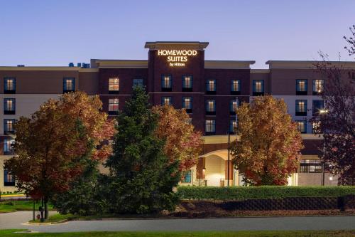 a building with a sign that reads homestead studios at Homewood Suites By Hilton Reston, VA in Reston
