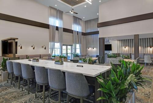 a large conference room with a large table and chairs at Homewood Suites By Hilton Edison Woodbridge, NJ in Edison