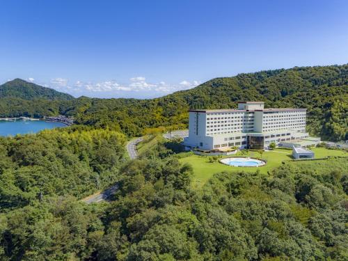 an aerial view of a building on a hill at Mercure Kyoto Miyazu Resort & Spa in Miyazu