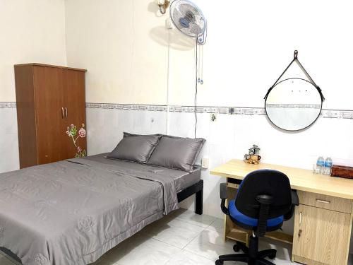 Ένα ή περισσότερα κρεβάτια σε δωμάτιο στο Motel An Bình