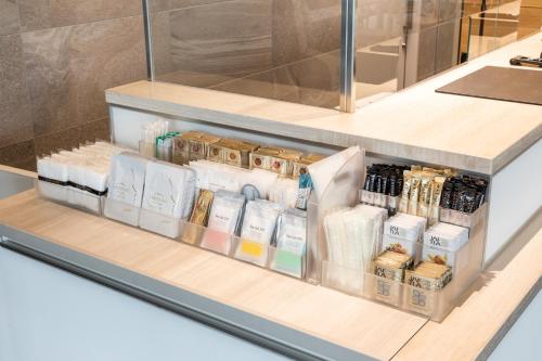 a shelf in a store filled with lots of products at Far East Village Hotel Tokyo Ariake in Tokyo