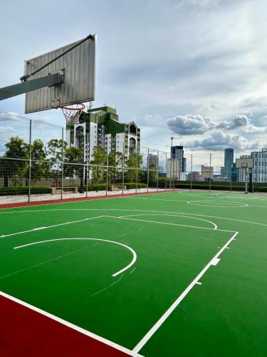 an empty basketball court with a basketball hoop at SS KL Sentral by NomadNest in Kuala Lumpur
