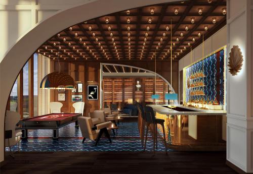 a lobby with a pool table and a bar at Rixos Tersane Istanbul in Istanbul