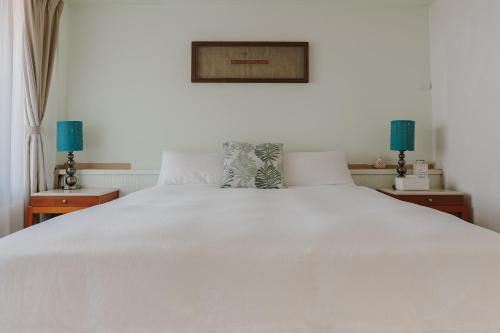 Katil atau katil-katil dalam bilik di Mountain Traveler Inn