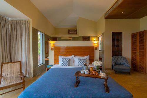 Una cama o camas en una habitación de Cliffhouse by Hireavilla -5BR with Private pool in Saipem