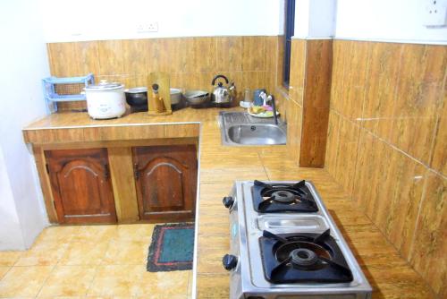 Ett kök eller pentry på Penasara Holiday Home