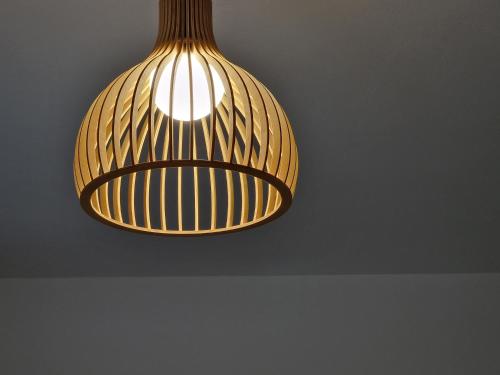 a light fixture hanging from a ceiling at MemRo Village House in Atsoupádhes
