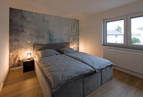 Postel nebo postele na pokoji v ubytování Casa Lorsch 2