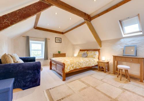 Postel nebo postele na pokoji v ubytování Trefloyne Lodge
