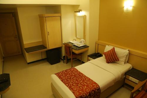 Ένα ή περισσότερα κρεβάτια σε δωμάτιο στο HOTEL SALEM CASTLE